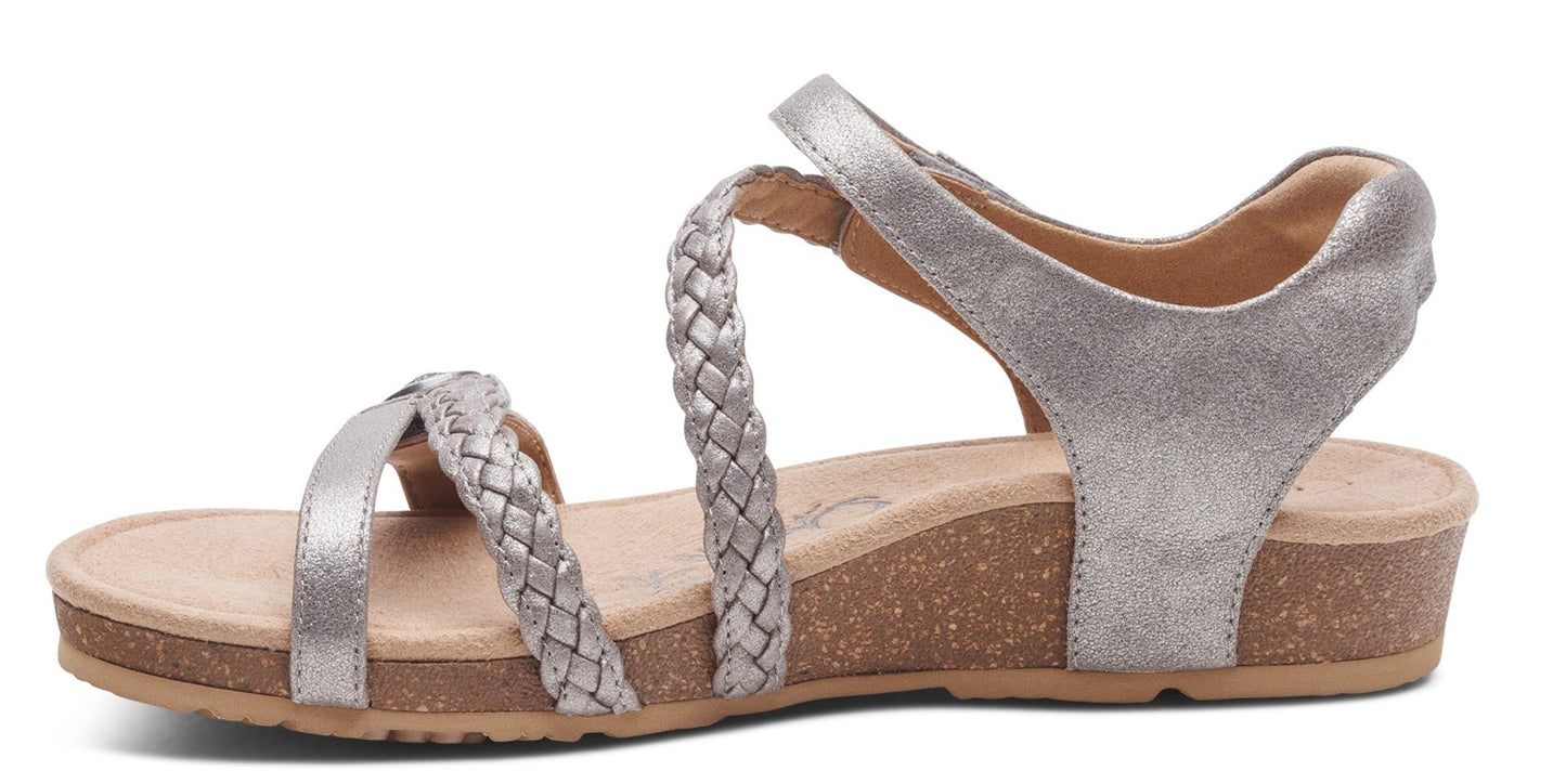 Silver sandal with braided straps and cork sole.