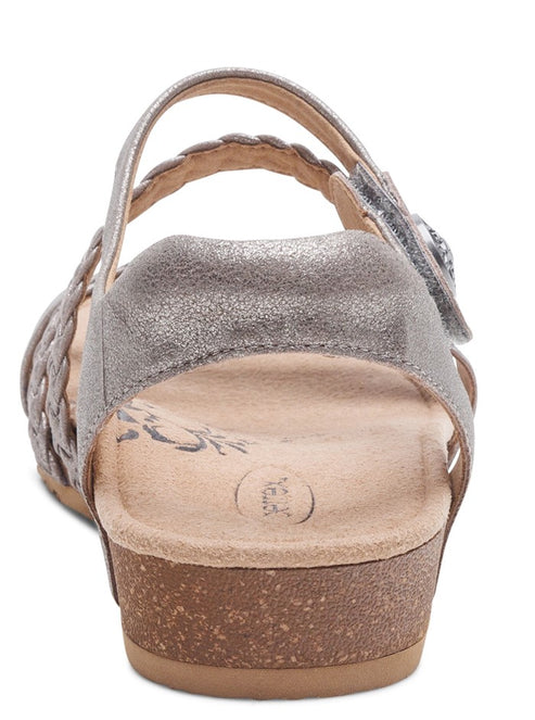 Rear view of a gray sandal with adjustable straps and a cork platform.