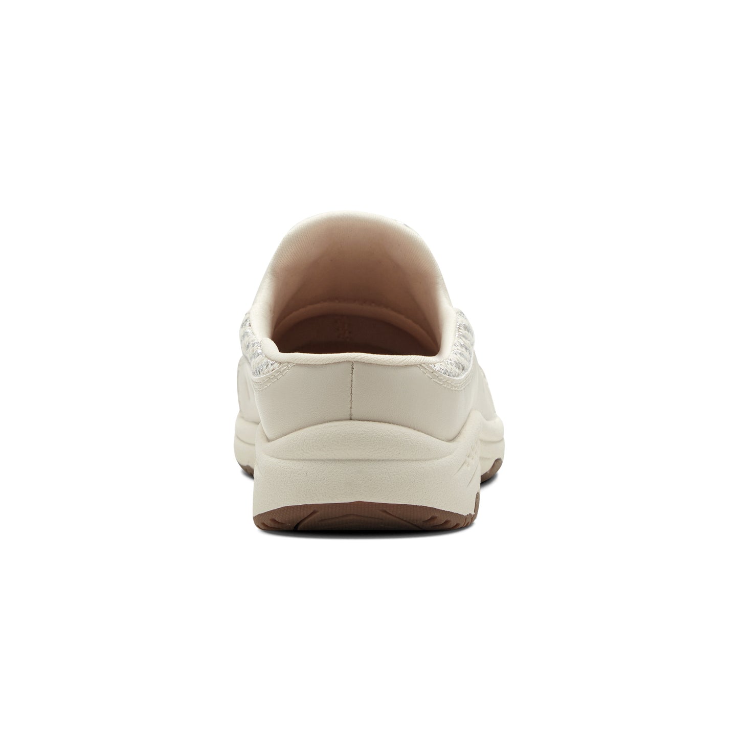 Beige slip-on shoe with low heel, viewed from the back.