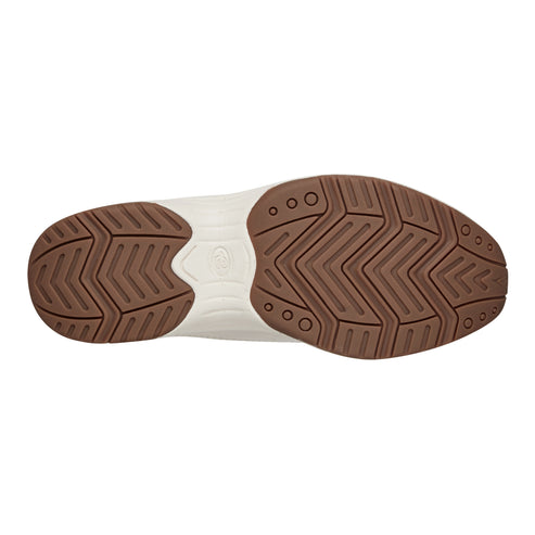 Bottom view of a brown rubber sole with chevron pattern.