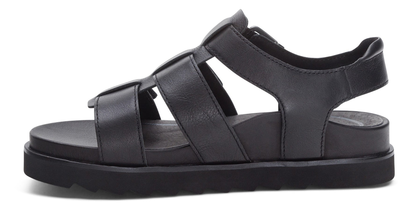 Black leather sandal with interwoven straps and a thick, flat sole.