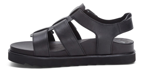 Black leather sandal with interwoven straps and a thick, flat sole.