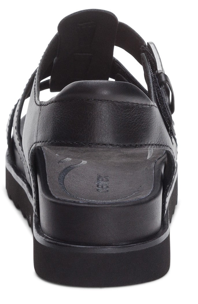 Back view of a black leather sandal with buckle strap.