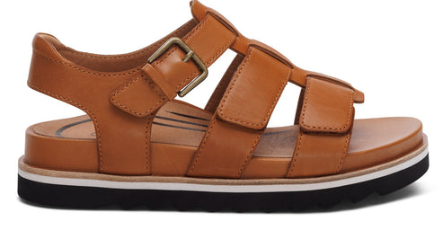 Brown leather sandal with a buckle strap and black sole.
