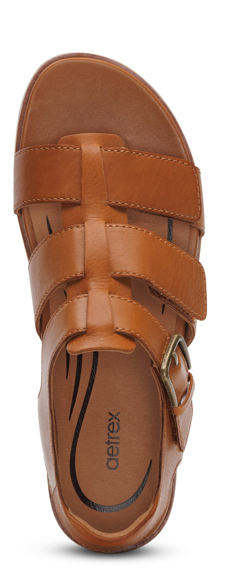 A tan sandal with a buckle and straps.