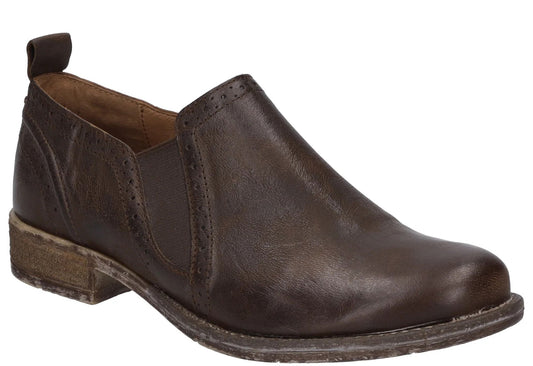 Dark brown leather slip-on shoe with low block heel and perforated trim.