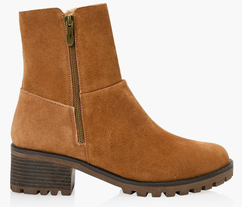 Suede ankle boot in caramel color with zipper closure and lug heel.