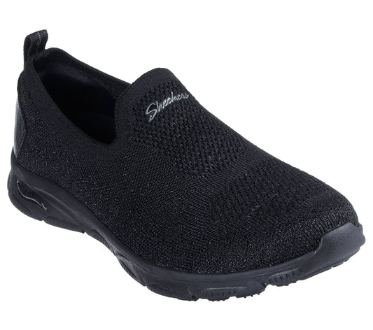 A black slip-on shoe with a knit upper and the word "Skechers" on the top.