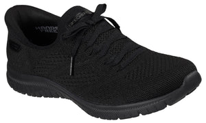 Black slip-on shoe with a knit upper, faux laces, and a black sole.