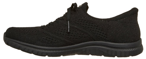 Black knit shoe with a textured sole and rounded toe.