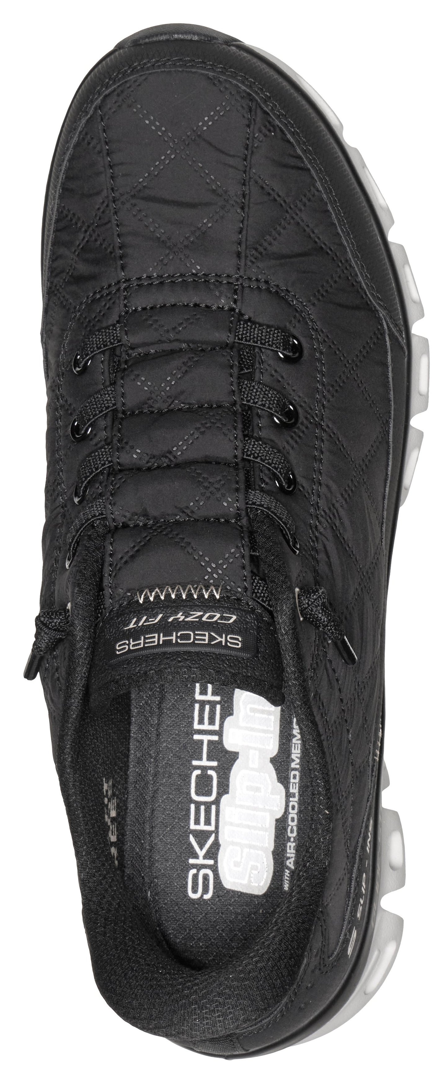 Black shoe with visible laces and a white Skechers logo.