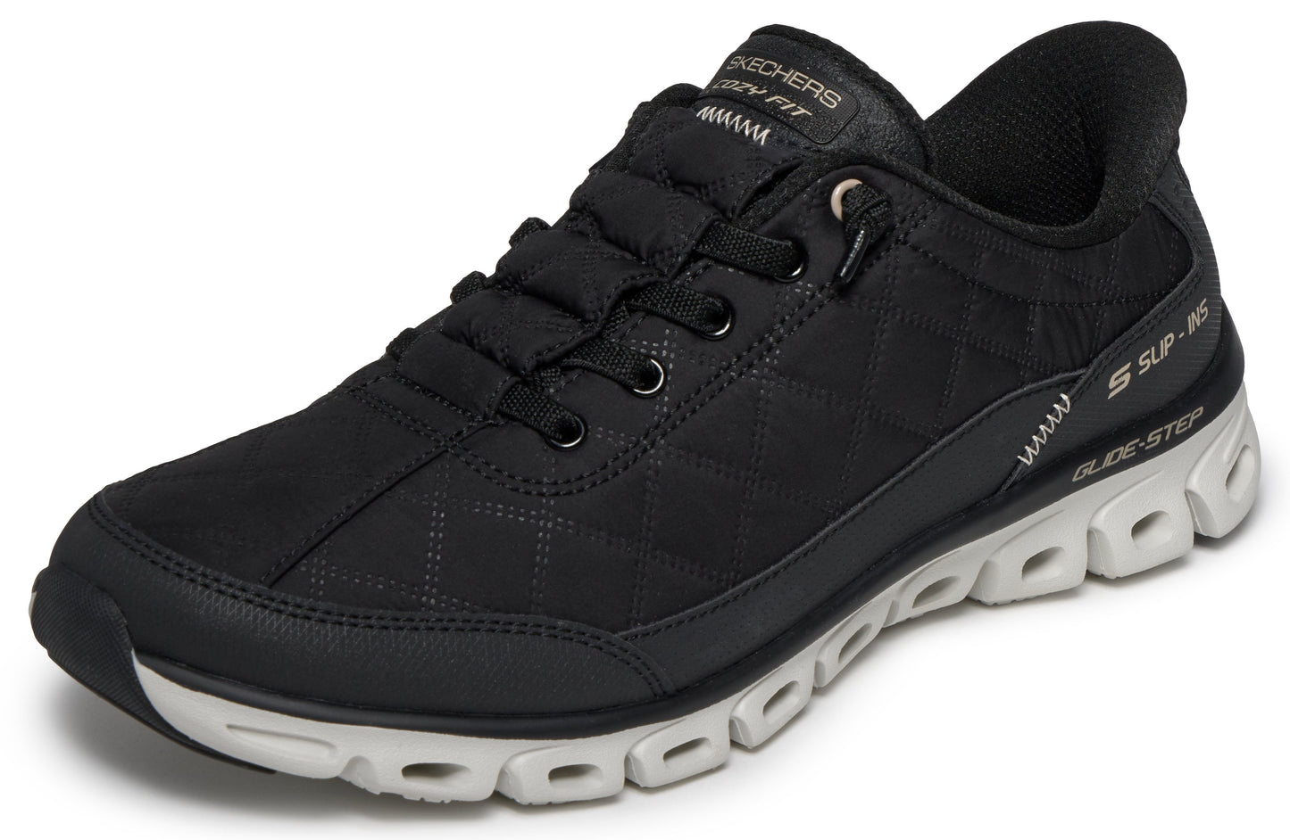 A black sneaker with a white midsole and a patterned upper.