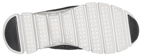 The sole of a shoe, with a pattern of white bars separated by gray rubber.