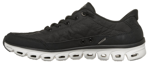 A black athletic shoe with a white sole.