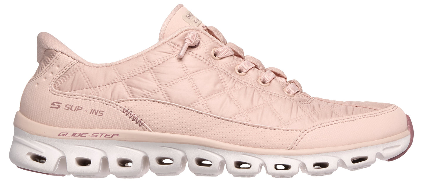 a pink sneaker with a white sole
