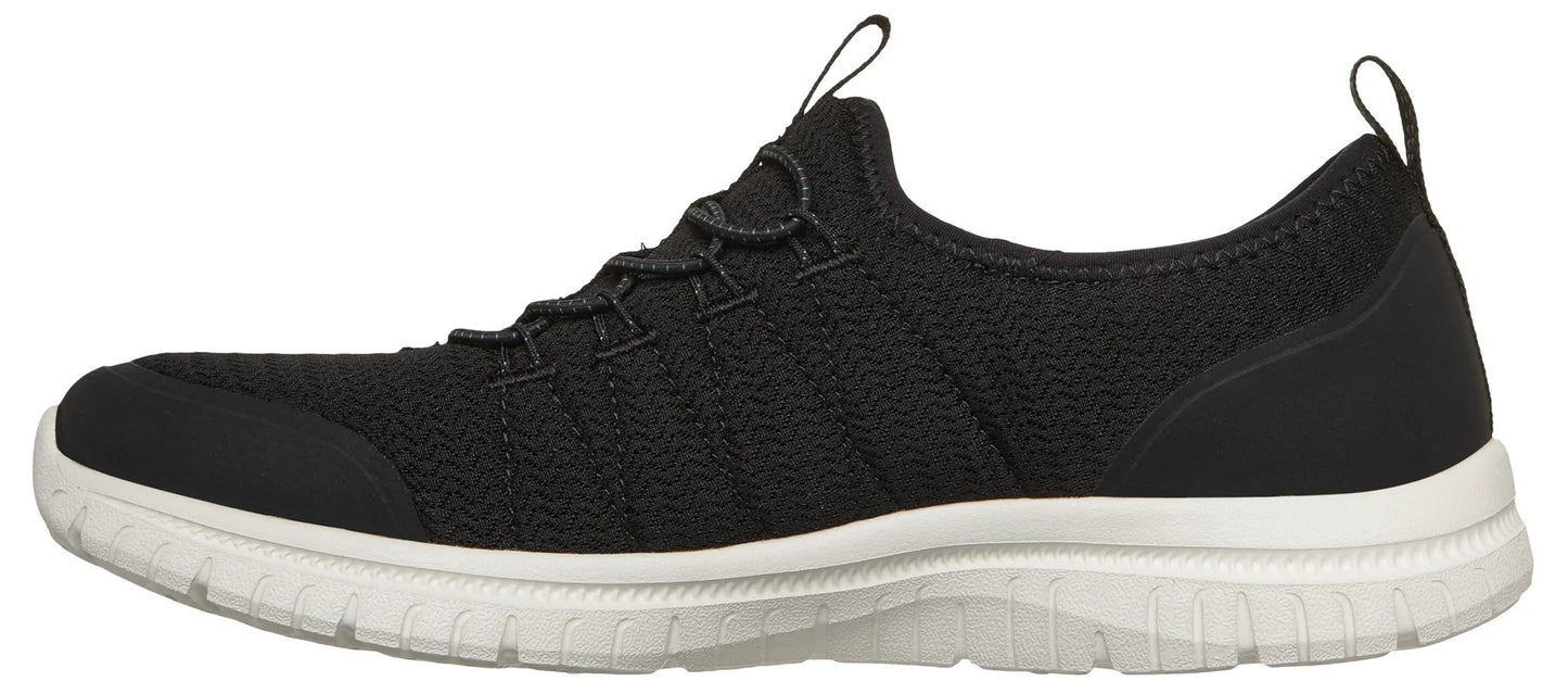 A black slip-on athletic shoe with a textured knit fabric upper, bungee-style laces, a reinforced toe cap, and a thick, white, grooved rubber sole.
