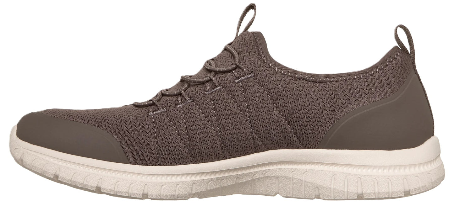 A slip-on sneaker with a dark brown, zigzag-textured mesh upper, elastic cord lacing, a reinforced toe cap, and a white cushioned sole.