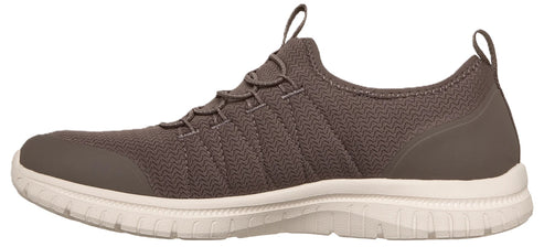 A slip-on sneaker with a dark brown, zigzag-textured mesh upper, elastic cord lacing, a reinforced toe cap, and a white cushioned sole.
