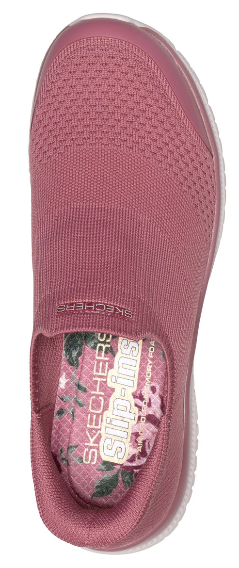 A mauve slip-on shoe with a floral insole.