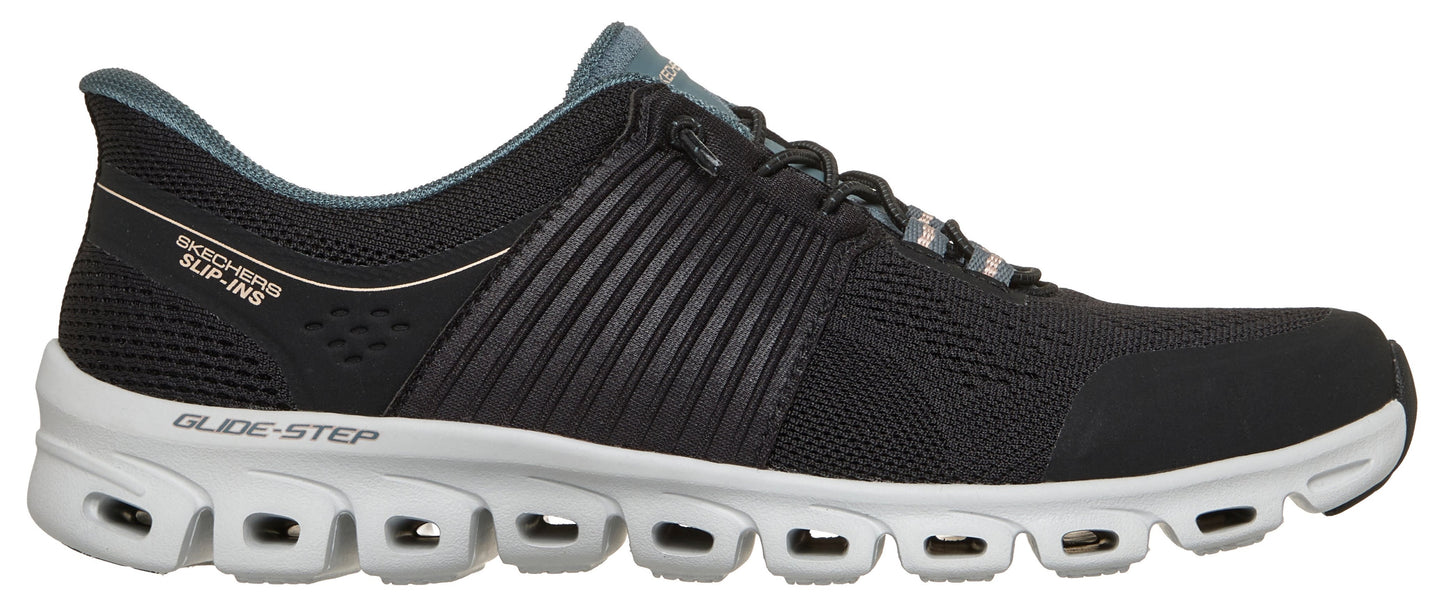 A black Skechers Slip-ins Glide-Step athletic shoe with a white, perforated, chunky sole, showing the lateral side with visible brand text on the upper and midsole.