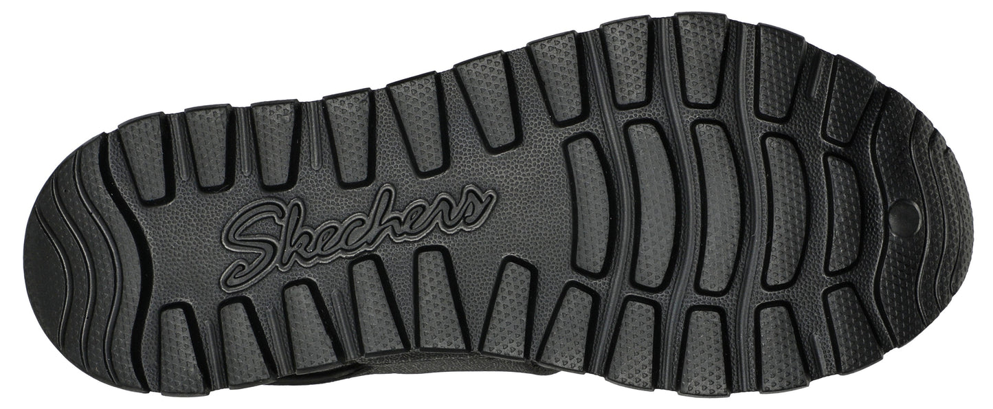 Black shoe sole with the word "Skechers" written across the center.