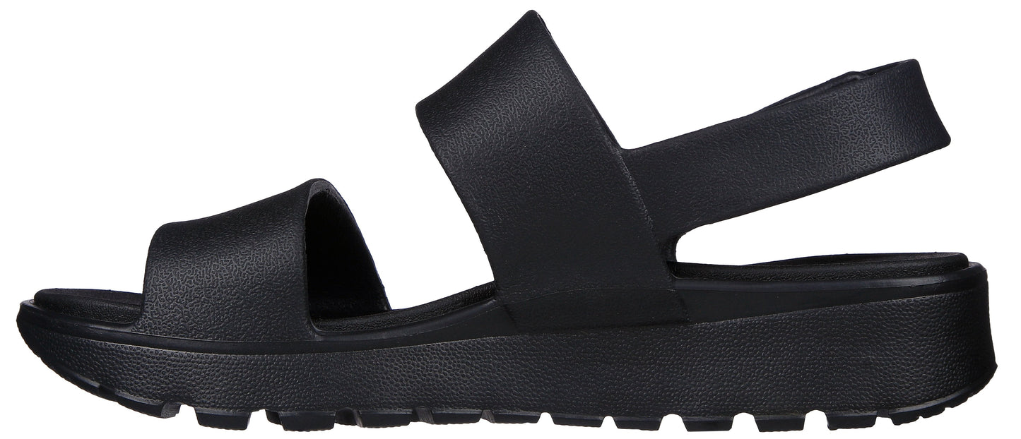 Black sandal with two straps and a thick sole.