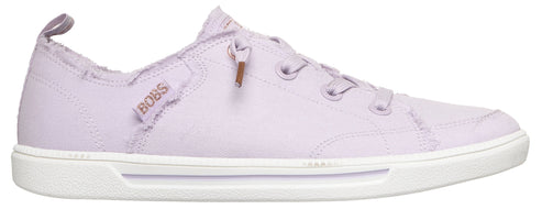 Lavender-colored canvas shoe with white sole and BOBS logo.