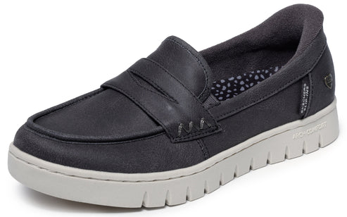 A dark gray slip-on loafer with a moc-toe design, a decorative strap across the vamp, and a thick, ridged light gray rubber sole labeled Arch Comfort.