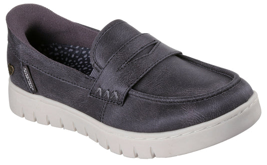A slip-on charcoal grey loafer with a textured faux leather upper and a chunky white platform sole.
