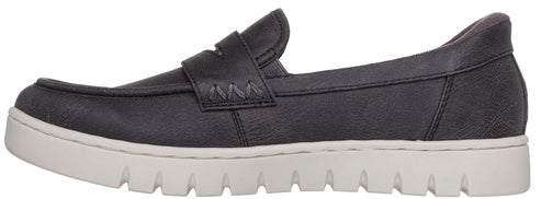 A dark gray women's leather loafer shoe with a thick, white, textured rubber lug sole, featuring a saddle strap across the instep with decorative stitching.