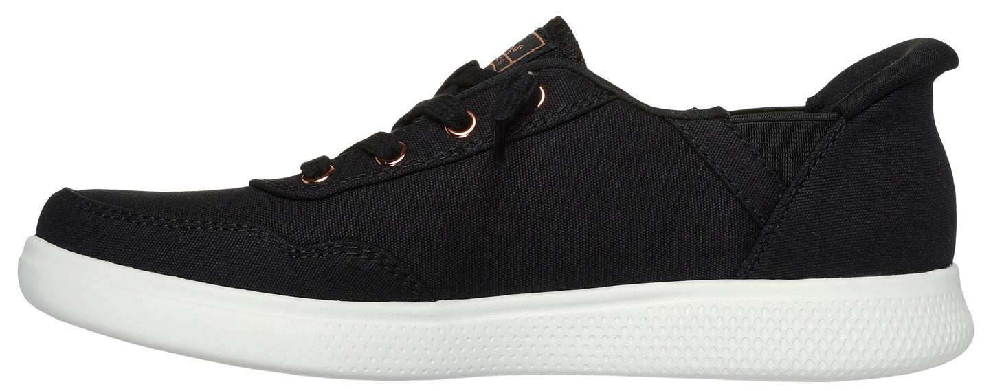 A black casual shoe with laces and a white sole.