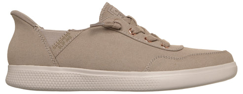 Beige canvas shoe with laces and a light tan sole.
