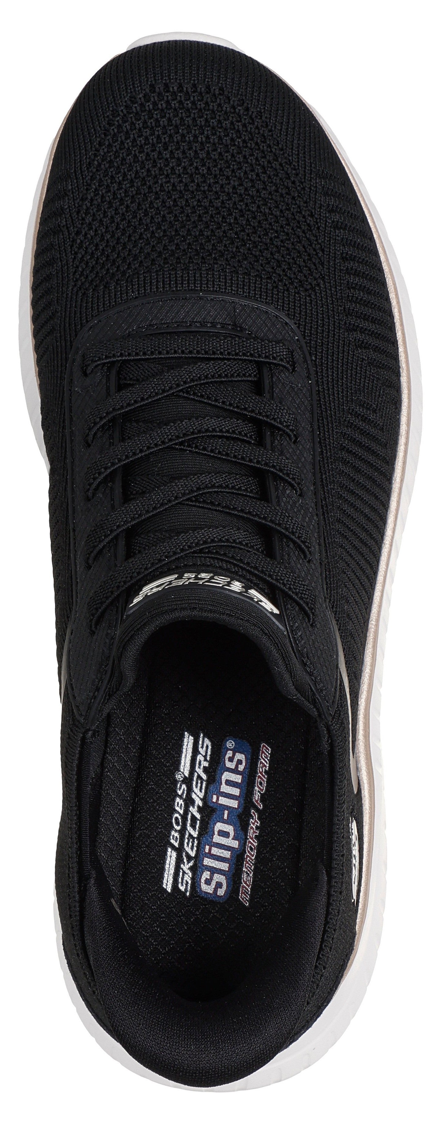 A black Skechers Bobs Slip-ins sneaker seen from a top-down perspective, featuring a knit mesh upper with decorative laces, a white outsole, and an interior footbed marked with the text Bobs Skechers Slip-ins Memory Foam.