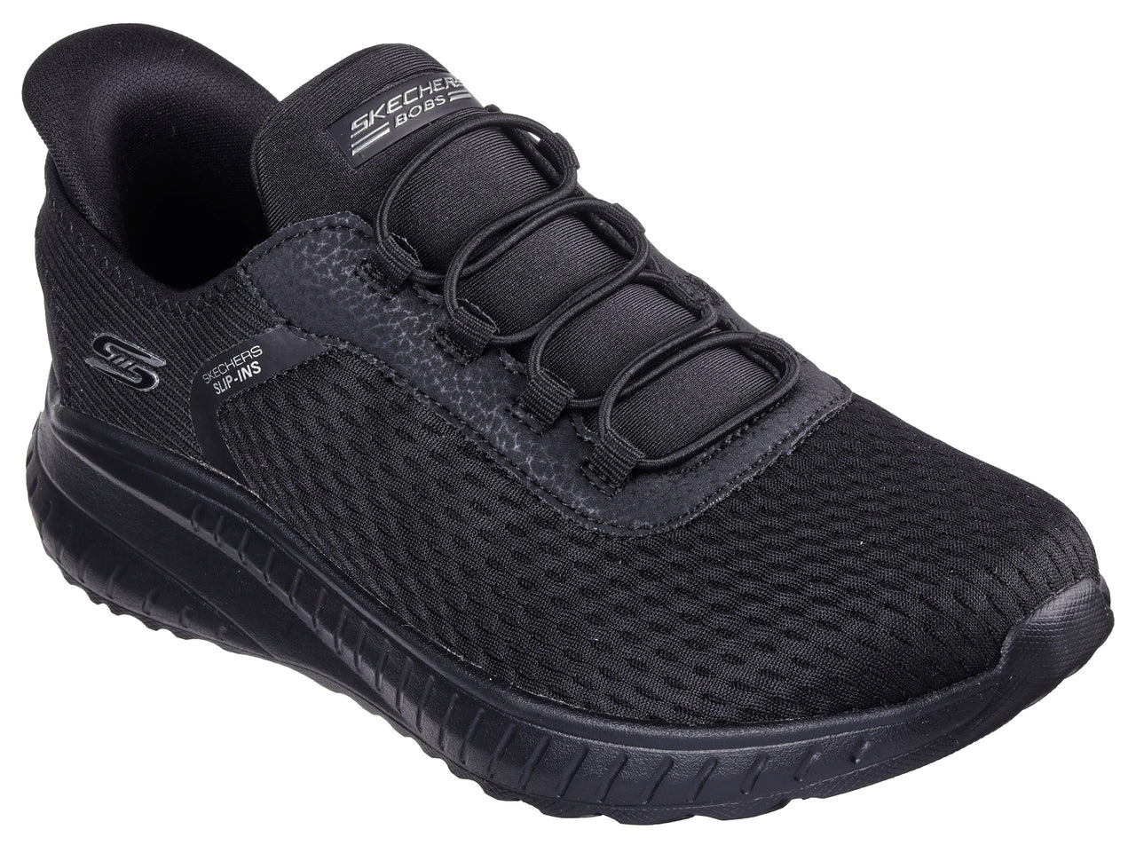 Black slip-on sneaker with mesh upper, bungee laces, and thick sole.