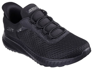 Black slip-on sneaker with mesh upper, bungee laces, and thick sole.