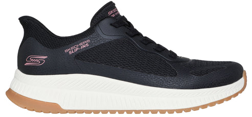 A black walking shoe with the words SKECHERS SLIP-INS in pink lettering, and a brown sole.