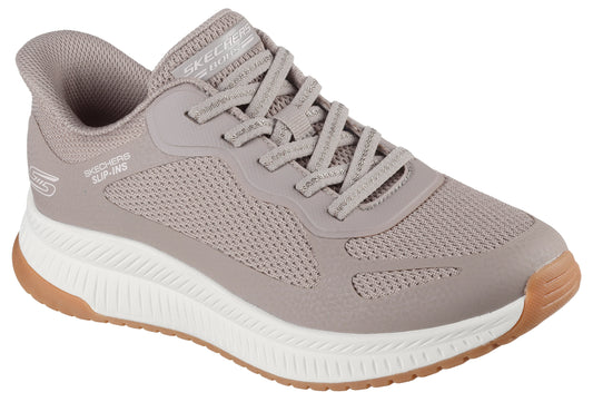 Slip-on low-top sneaker with mesh upper and synthetic overlays, white midsole, and gum outsole.