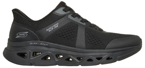 A black Skechers Slip-ins Glide-Step athletic shoe, viewed from the side, featuring a mesh upper, black laces, a geometric cutout sole design, and the text Skechers Slip-ins and Glide-Step branded on the exterior.
