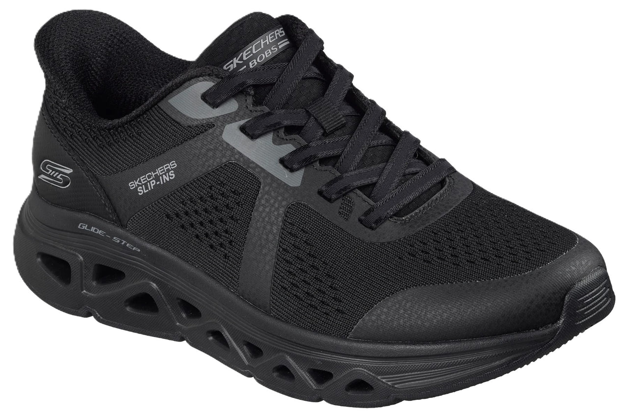 A black Skechers Bobs Slip-ins sneaker featuring a breathable mesh upper with synthetic overlays, a lace-up front, a padded collar, and a signature cut-out Glide-Step midsole.