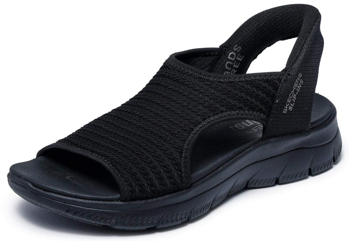 A black sandal with elastic straps, an open toe, and visible text that reads 'SLIP-INS' on the heel.