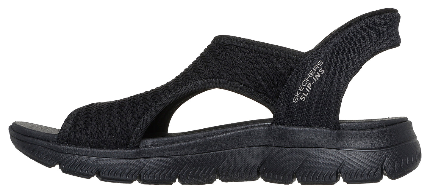 A black sandal with SKETCHERS SLIP-INS branding on the ankle strap.