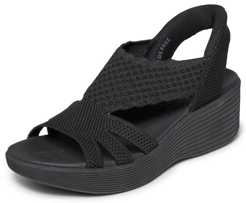 Black sandal with slingback and platform sole.