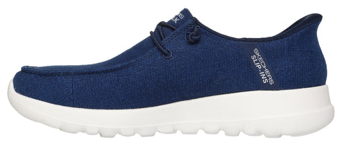 A blue slip-on shoe with white sole.