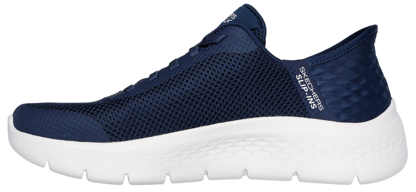 A navy blue sneaker with a white sole and "SKECHERS SLIP-INS" printed on the side.