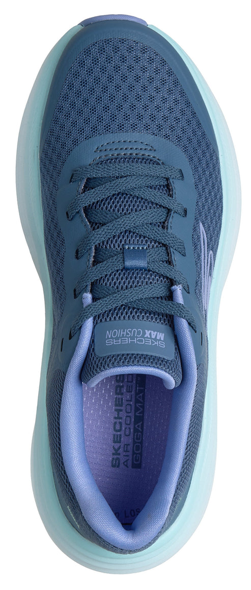 A top-down view of a dark blue mesh running shoe with a light blue foam sole, laces, and light purple interior padding, with text on the tongue reading 'SKECHERS MAX CUSHION' and on the insole reading 'SKECHERS AIR COOLED GOGA MAT'.