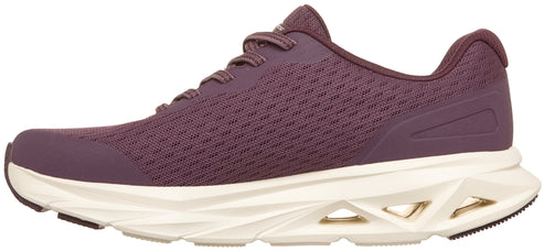 A plum-colored women's athletic sneaker with a mesh upper, lace-up closure, and a thick, chunky off-white cushioned midsole with geometric cutouts along the heel.