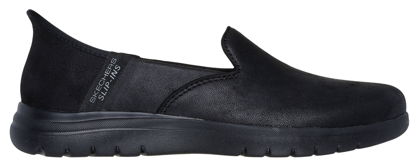 A black slip-on shoe.