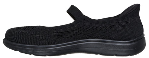 A black women's slip-on mary jane shoe with a strap.
