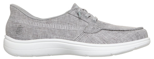 A gray boat shoe with a white sole.