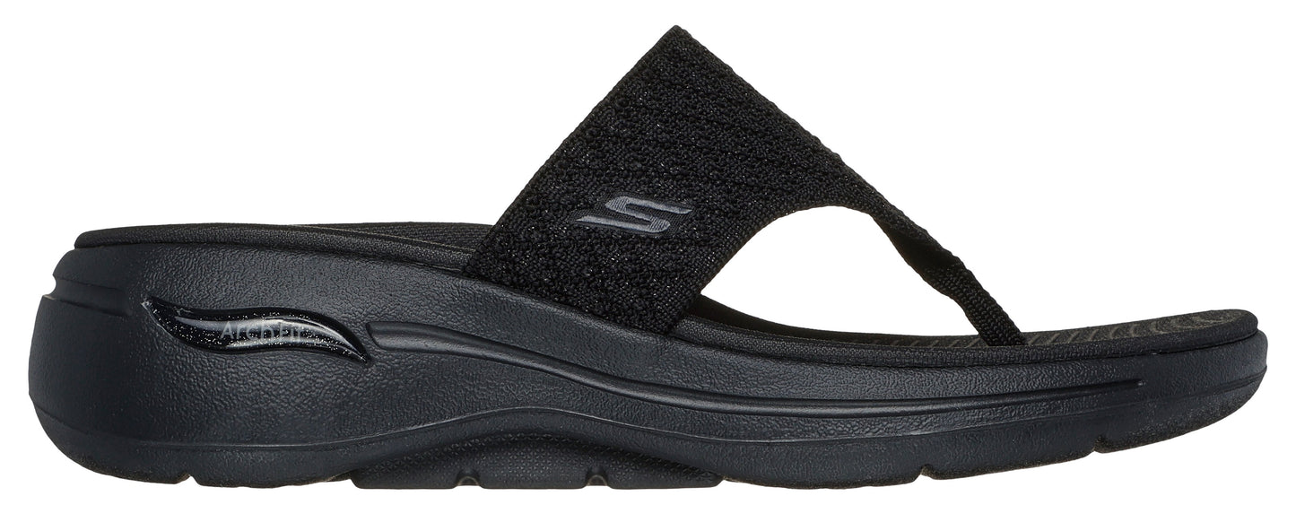A black flip-flop sandal with the Skechers logo.